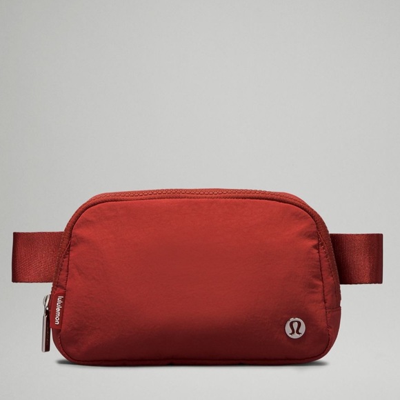 lululemon athletica Handbags - NWT Lululemon Everywhere Belt Bag Terra Orange Color